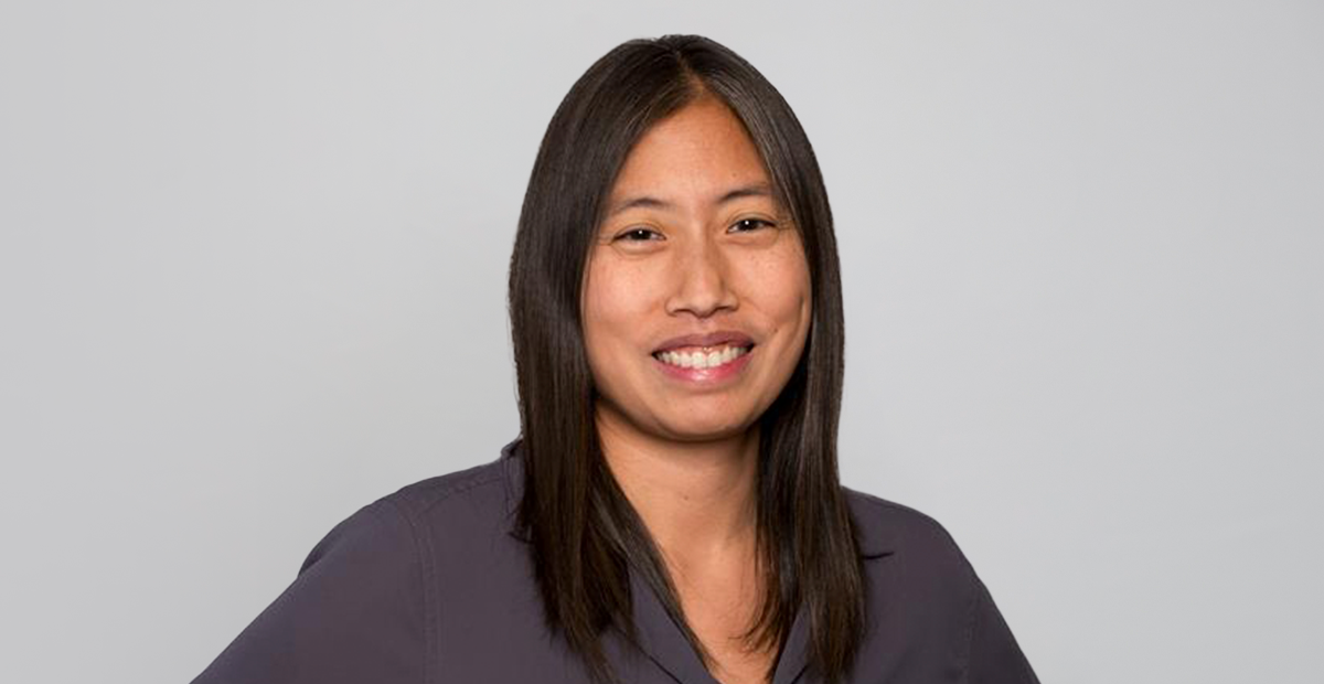 Head shot of Amy Inzanti from shoulder up with smile